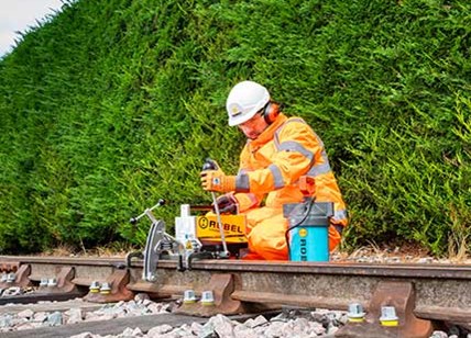 Rail Engineer Working On Rail Track