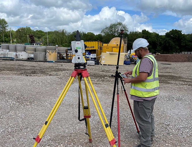 Robotic Total Station Being Used By Surveyor At Coed Derw Housing Development