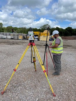 robotic-Total-Staion-Being-Used-By-Surveyor-At-Coed-Derw-Housing-Development