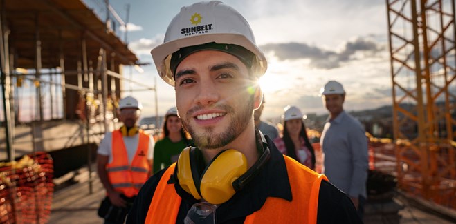 Sunbelt workers stood looking into the distance