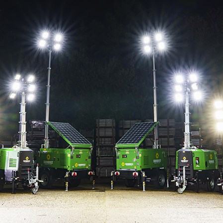 Sunbelt Rentals Tower Lights Illuminated At Night