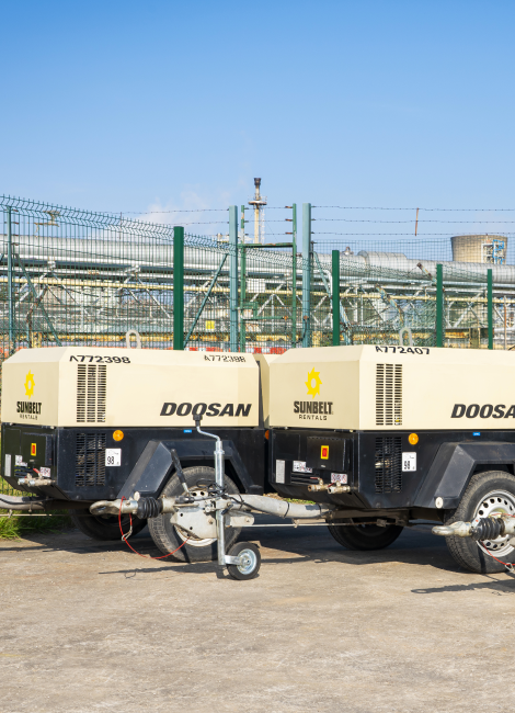 Doosan compressor in front of industrial site