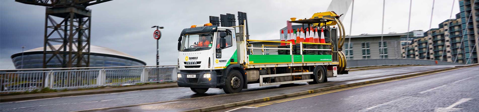 Traffic Management Truck Driving Along A Bridge In Glasgow