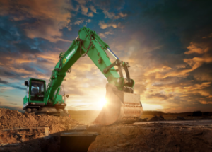 Sunbelt Rentals green excavator working outdoors