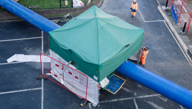 Trunk-main replacement in a densely populated area